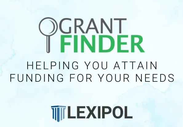 A neatly made bed with a patterned mattress and pillows.