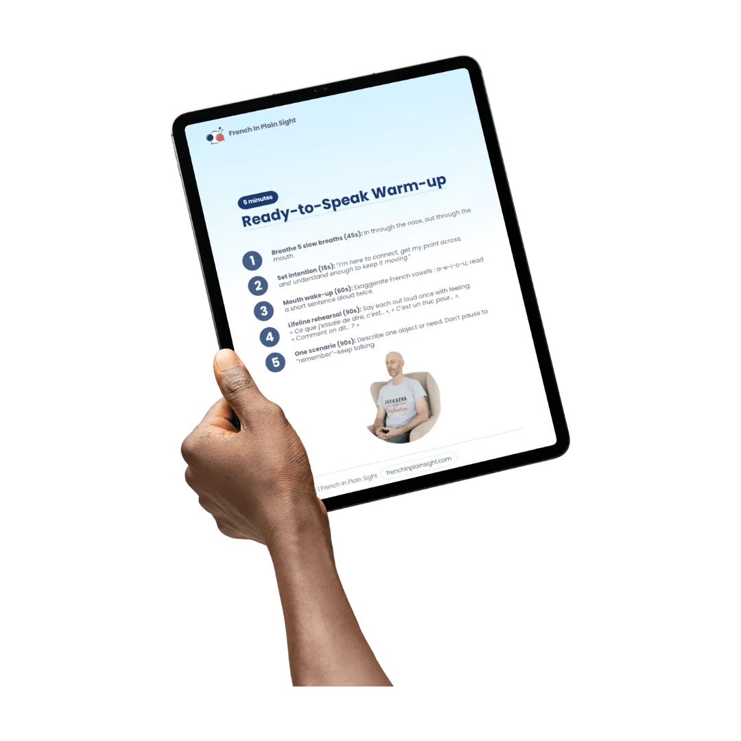 Image of a hand holding an iPad open at a page in the Beat The French Freeze guide.