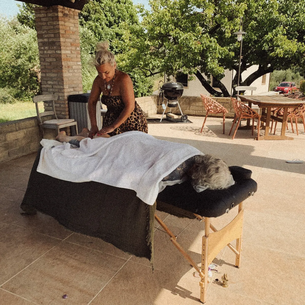 image of massage by the pool during the retreat