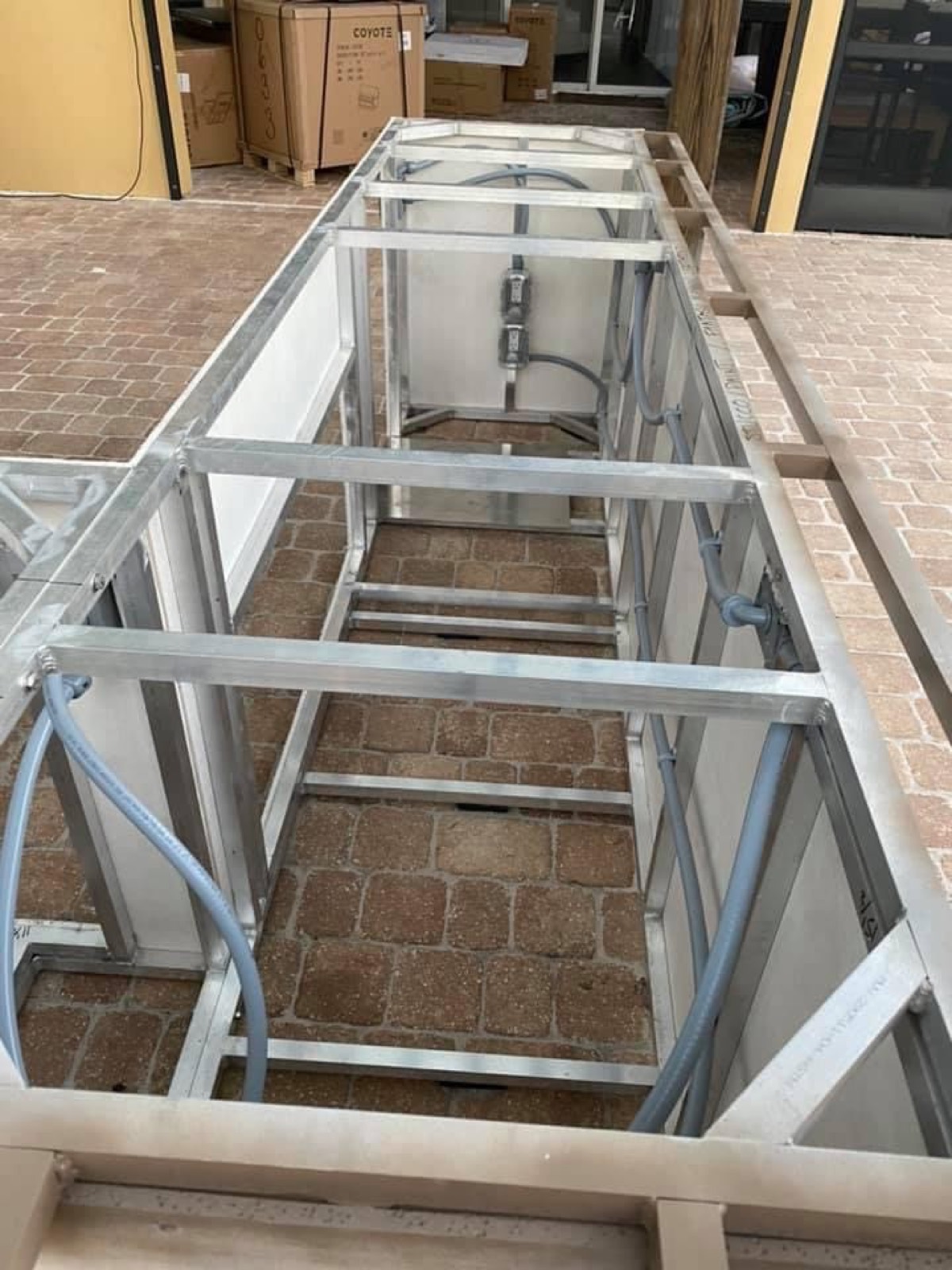 Welded aluminum outdoor kitchen frame fabricated in-house at the Endless Summer shop in Melbourne, FL