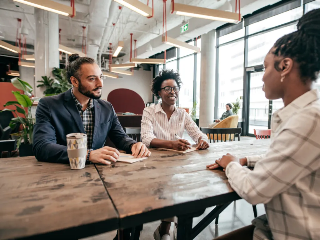 a notepad with the words marketing strategy written on it