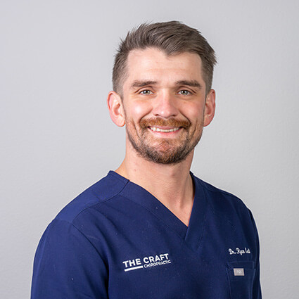 Dr. Ryan in a bright clinic setting