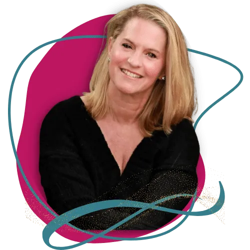 Linda Downey smiling and relaxed, sitting with a cup of tea