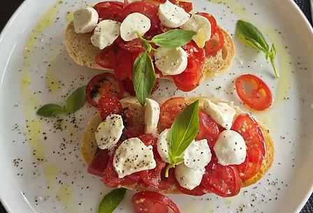 Classic Italian bruschetta with fresh tomatoes and mozzarella at Taste Italian Nottingham