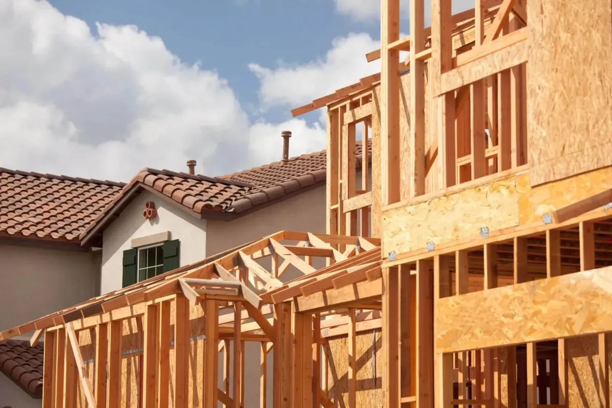 Fresh lumber framing in place for a new home addition project.