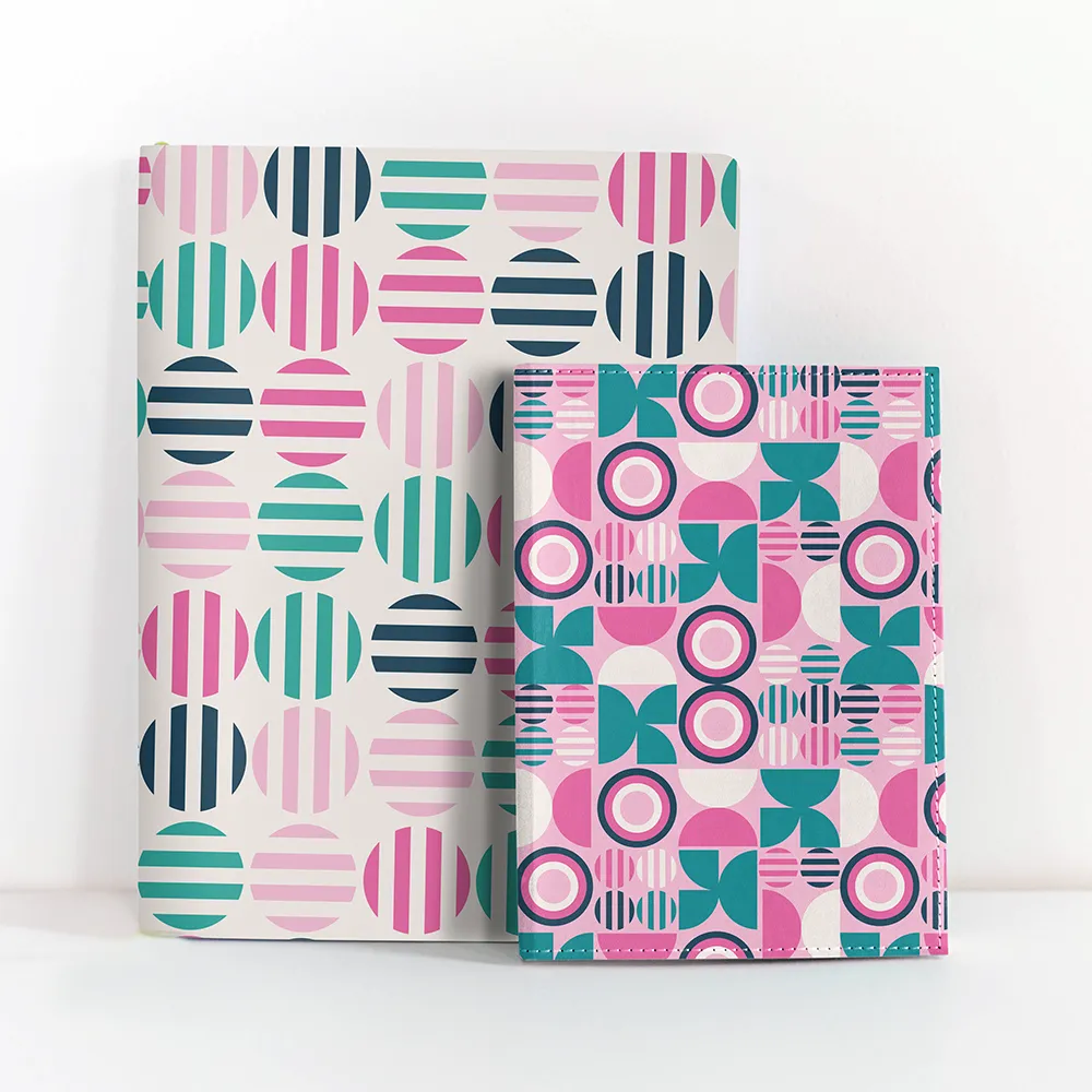 Mockup of patterns from the Symbolic Memories Cherry Blossom Collection y Yvonne erry Design on notebooks