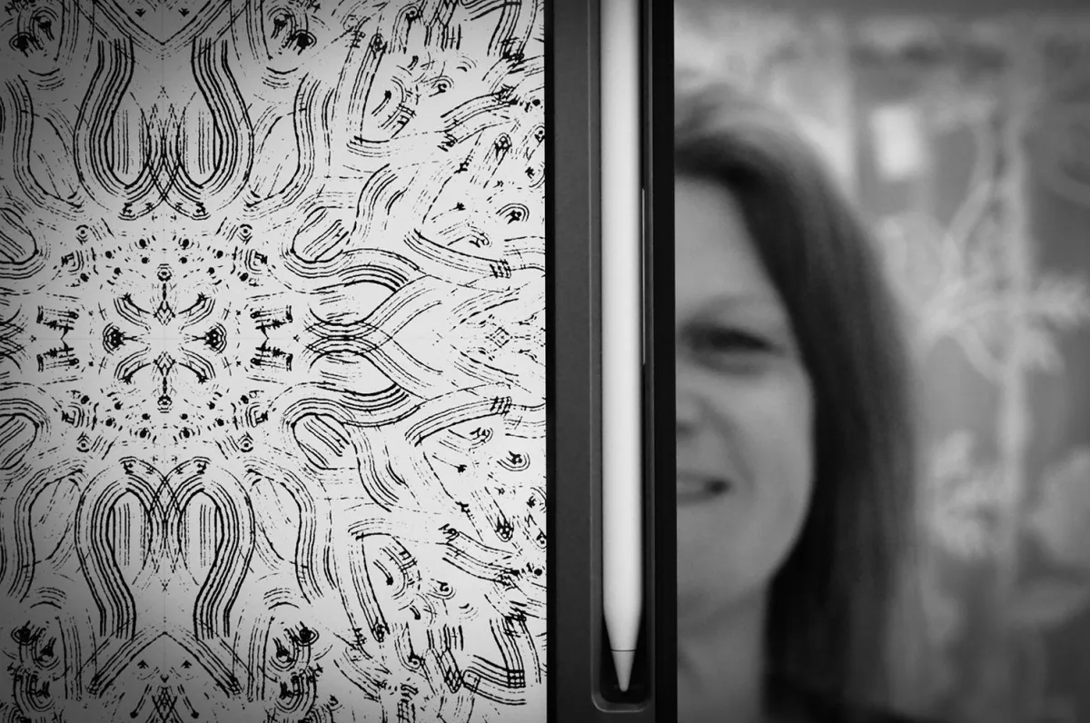 MOck up of patterns from the Symbolic Memories Cherry Blossom Collection by Yvonne Perry on bedding