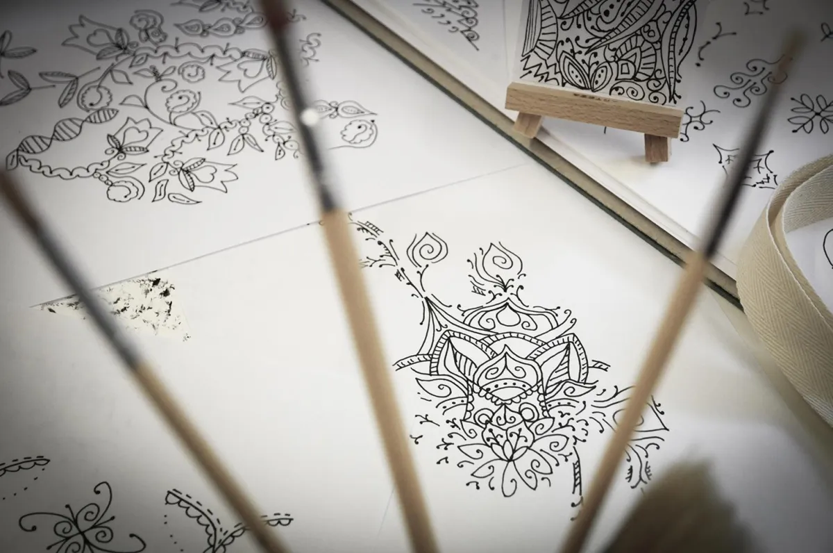 Mockup of patterns from the Symbolic Memories Cherry Blossom Collection y Yvonne erry Design on notebooks