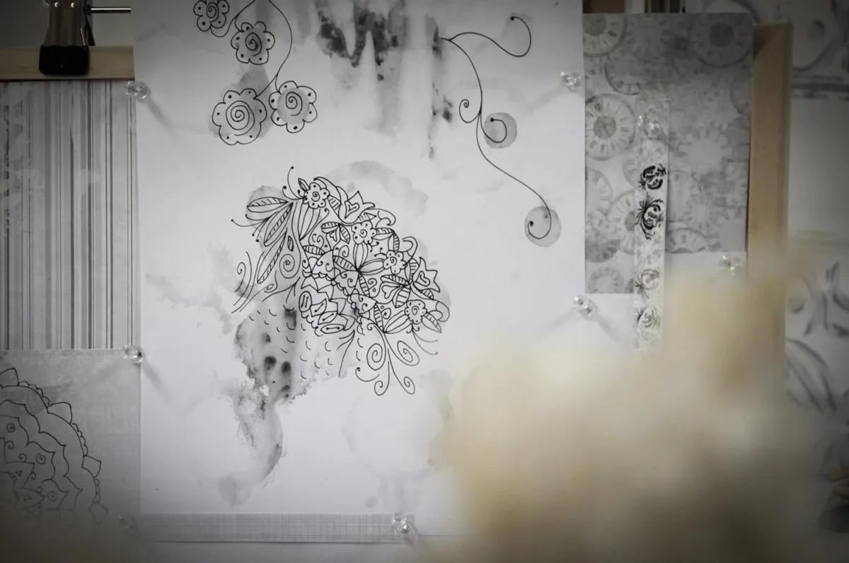 MOck up of patterns from the Symbolic Memories Cherry Blossom Collection by Yvonne Perry on bedding
