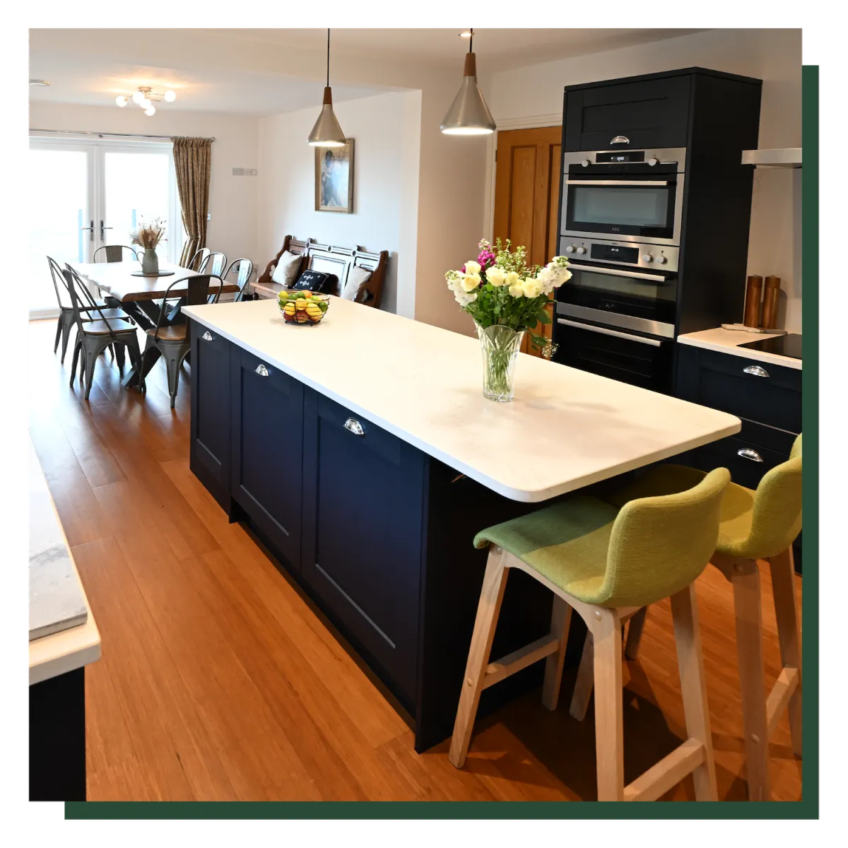 Kitchen with kitchen island with flowers