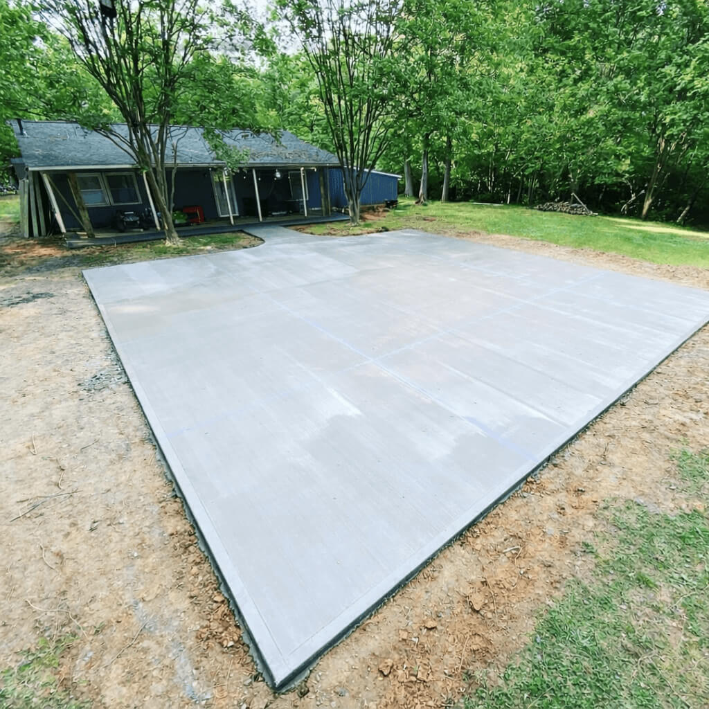 Residential concrete driveway with smooth finish installed in North Carolina