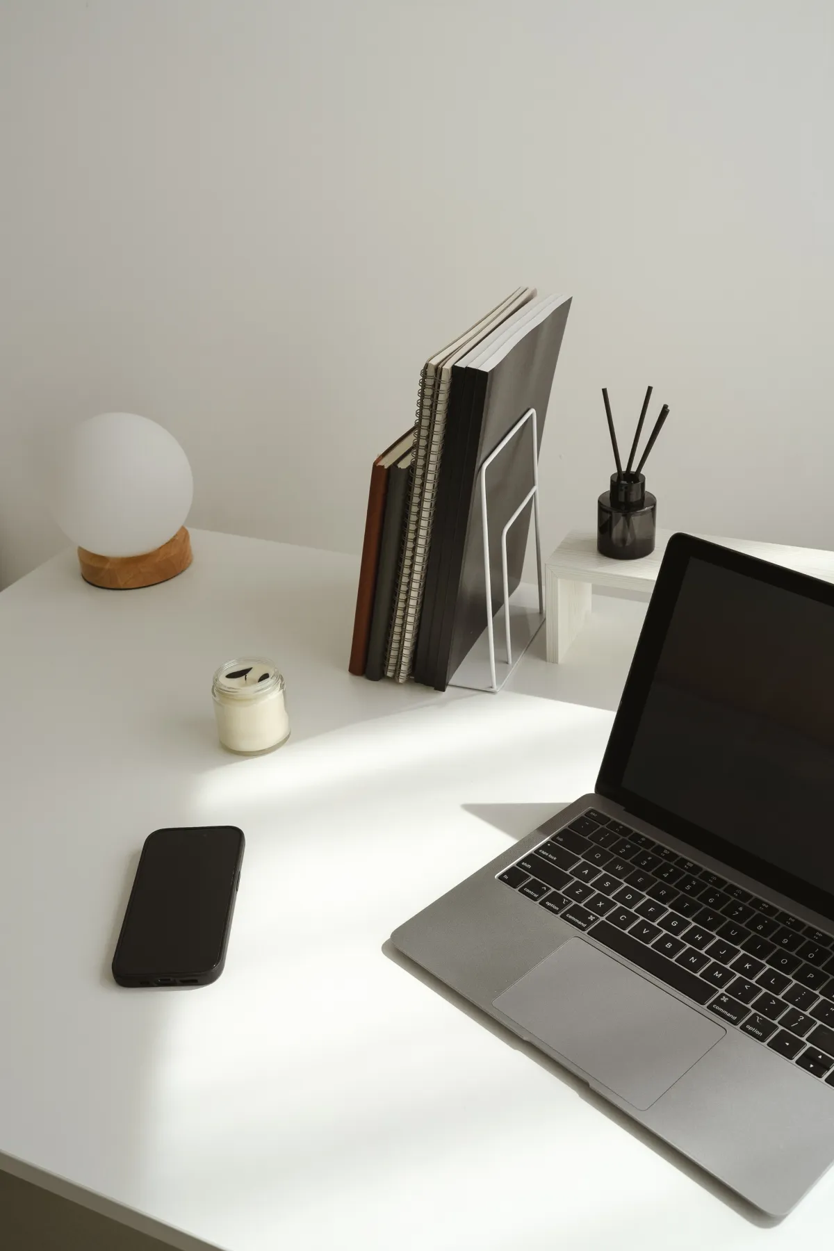 Minimal organised workspace representing virtual assistant support and streamlined business operations.
