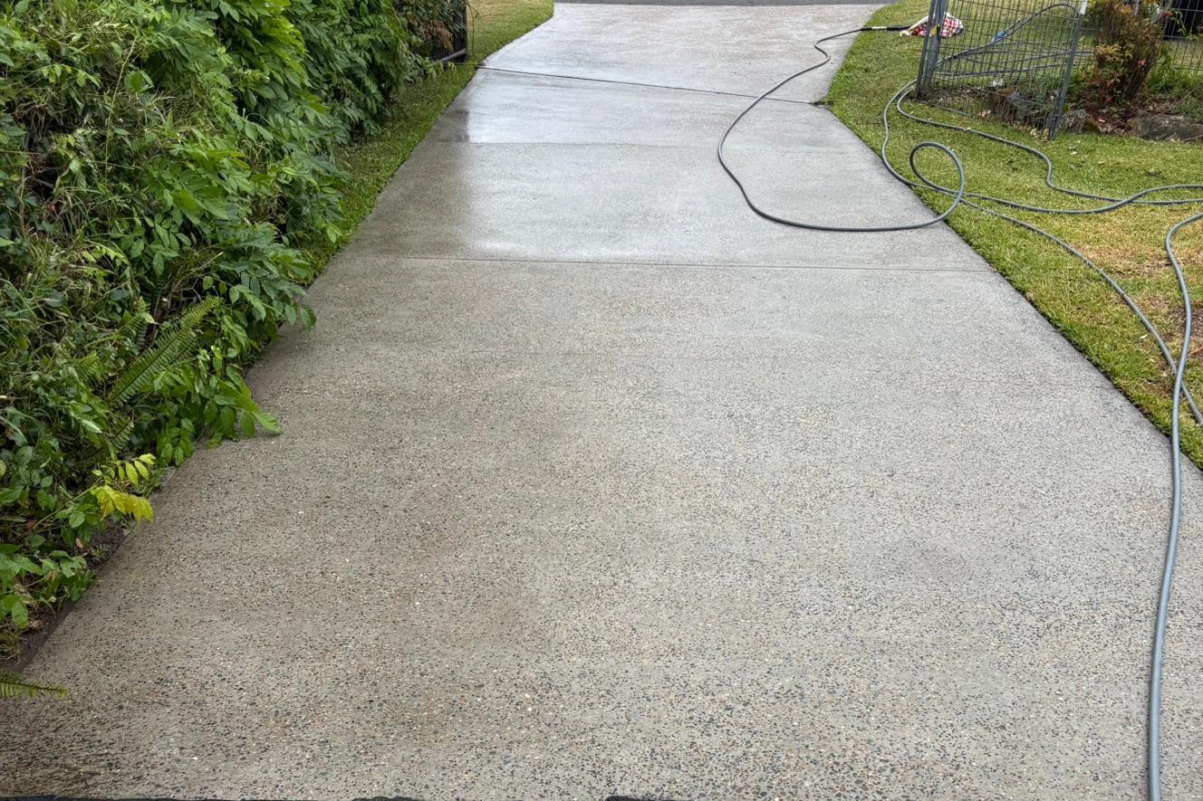Concrete driveway pressure cleaning results at a property in Cardiff, Lake Macquarie NSW