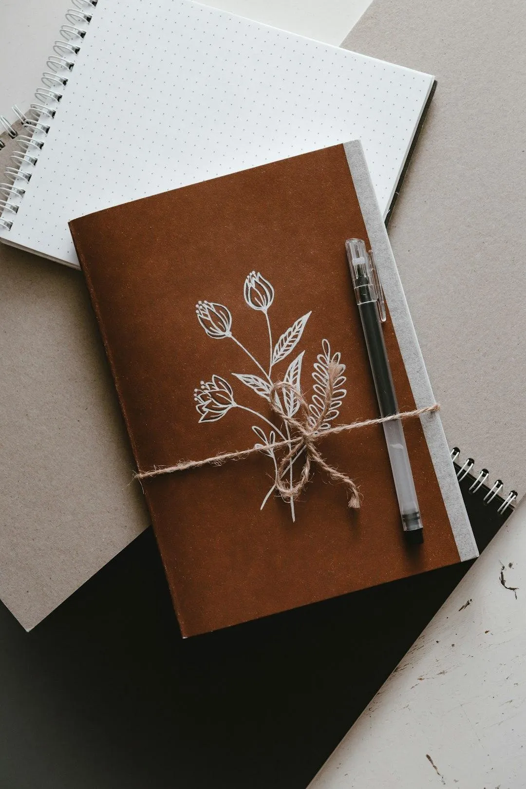 Soft journal mockup with pen and delicate details
