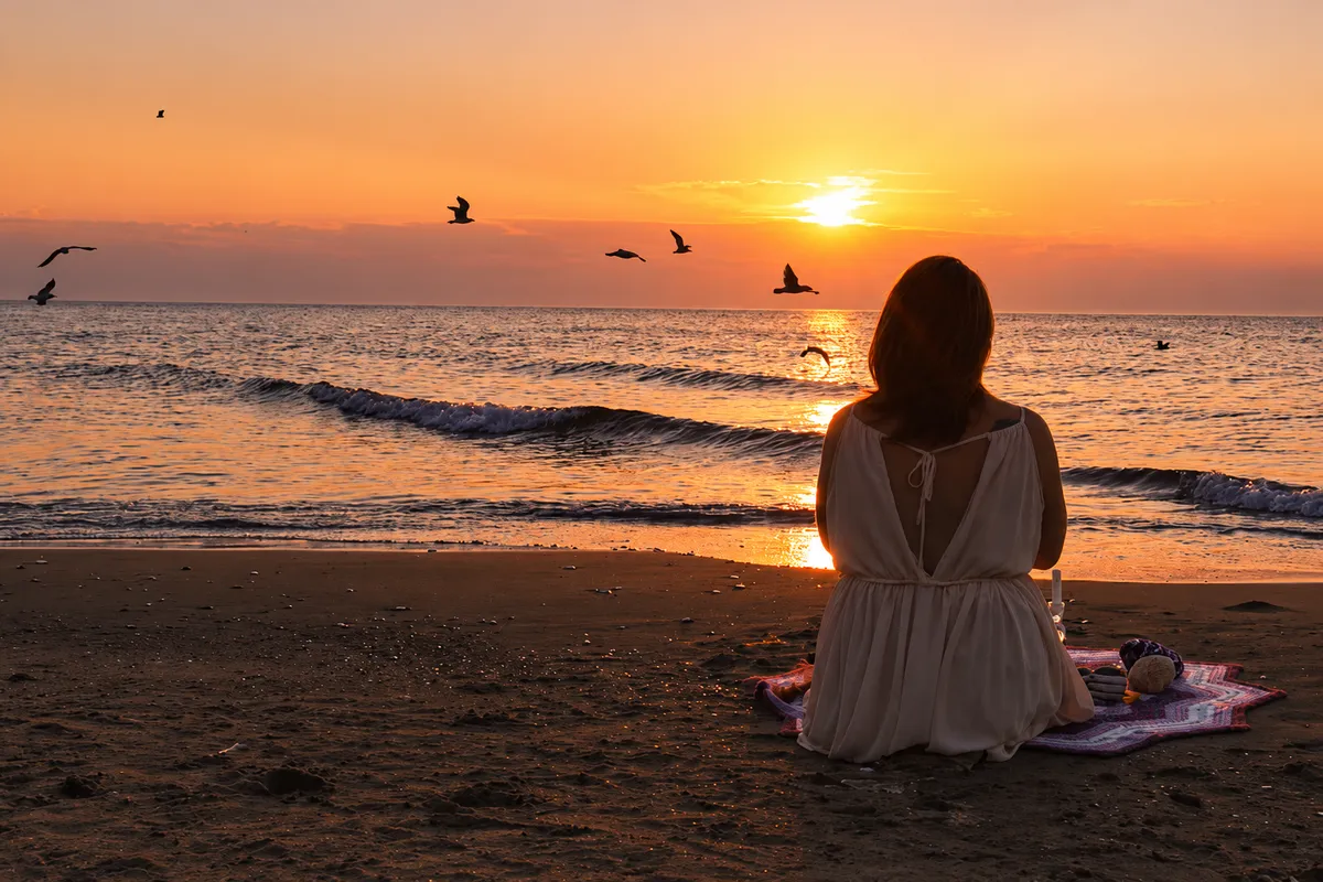 Ancestral energy healing ceremony with warm light and botanical elements