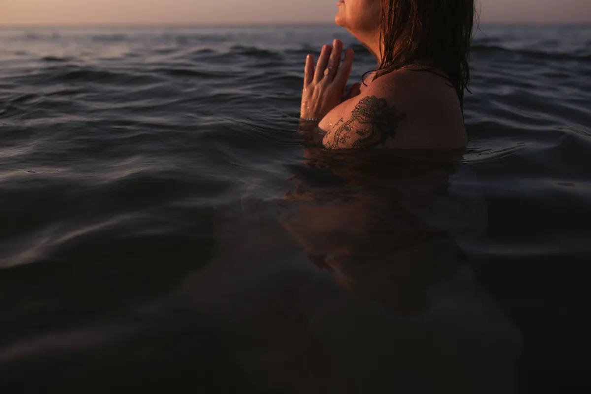 Ancestral energy healing ceremony with warm light and botanical elements