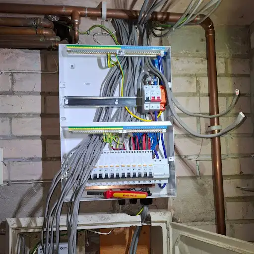 Full property rewire carried out by Electro Virium Ltd, showing a new consumer unit and electrical wiring