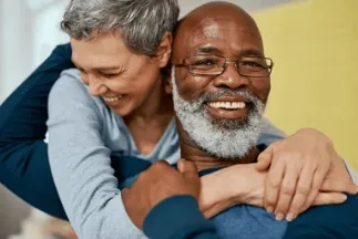 person holding black and white round ornament
