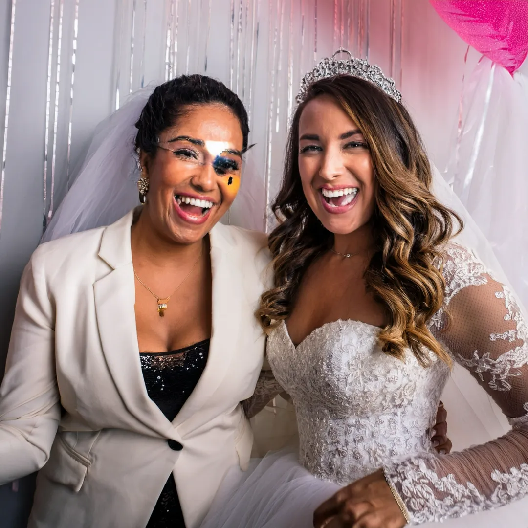 Brides and bridesmaids using Dallas Selfie Photo Booth by Tblack Studios