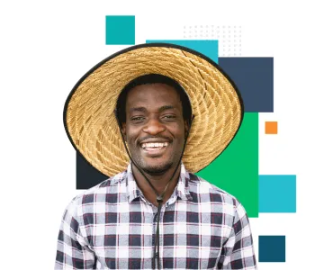 A man wearing a large straw hat and a checkered shirt is smiling in front of a colorful geometric background. The background includes overlapping squares and rectangles in shades of blue, green, and orange.