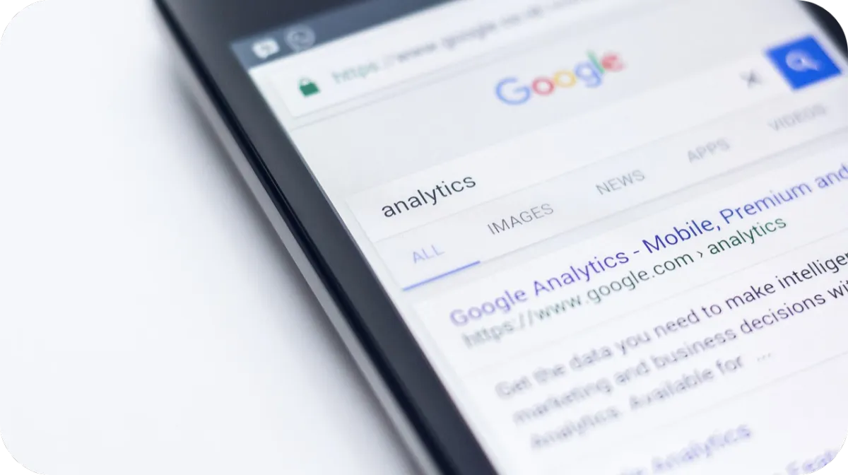 cell phone showing the words Google analytics in the search results