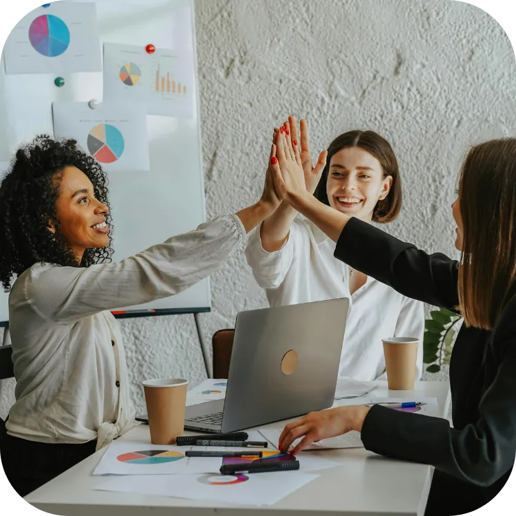 digital marketing team celebrating AI SEO win