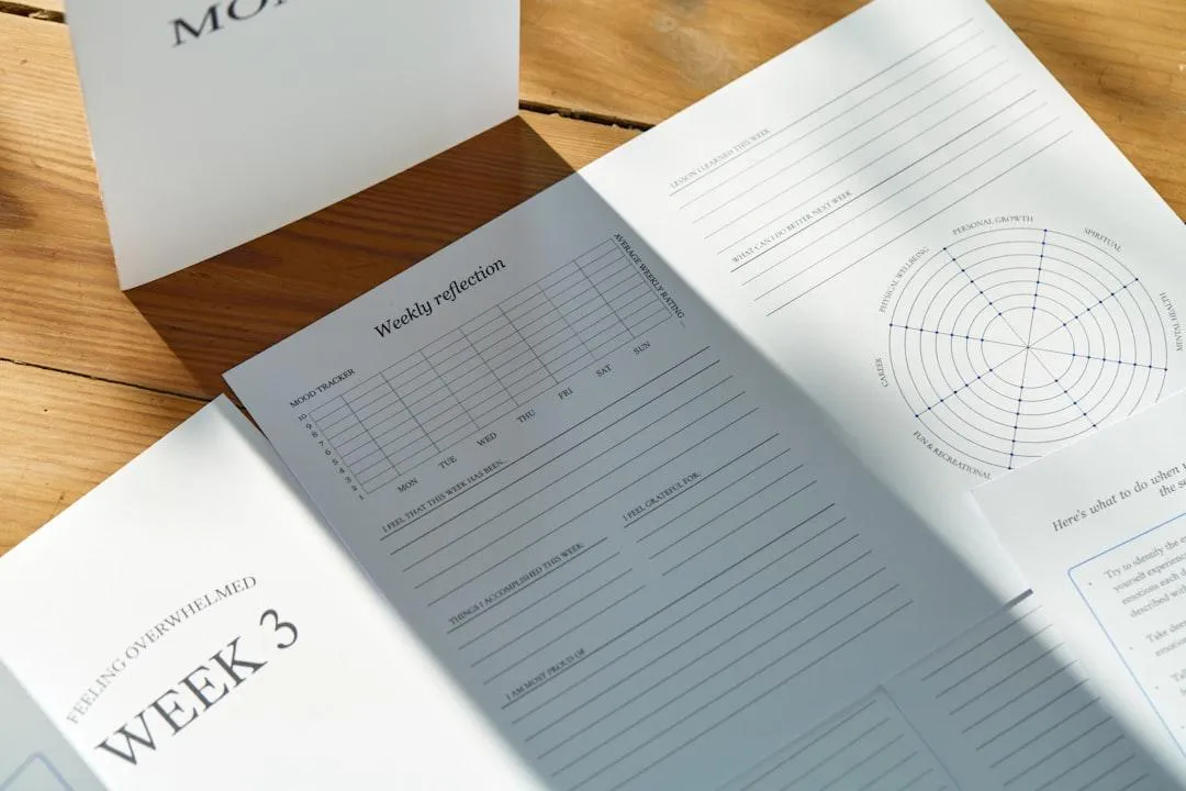 calm lake reflecting rock cliffs and clear blue skies