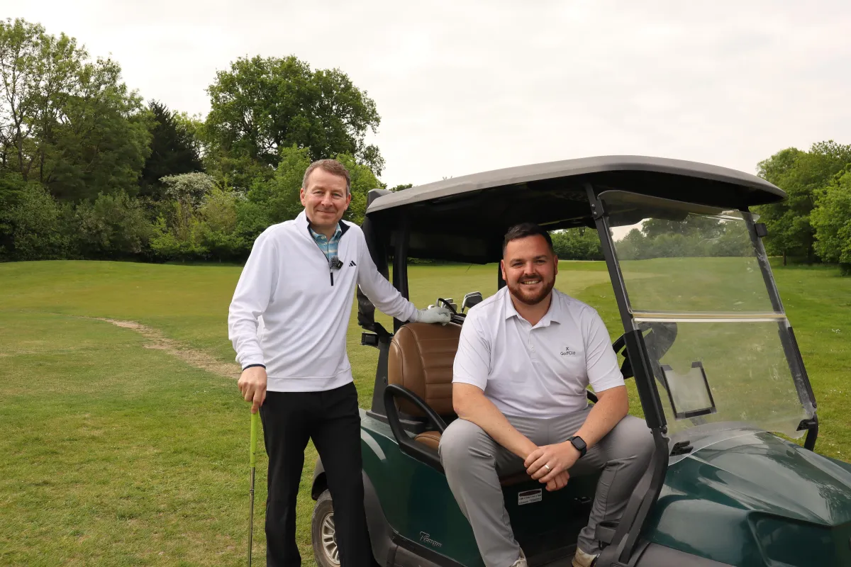 golf course near body of water