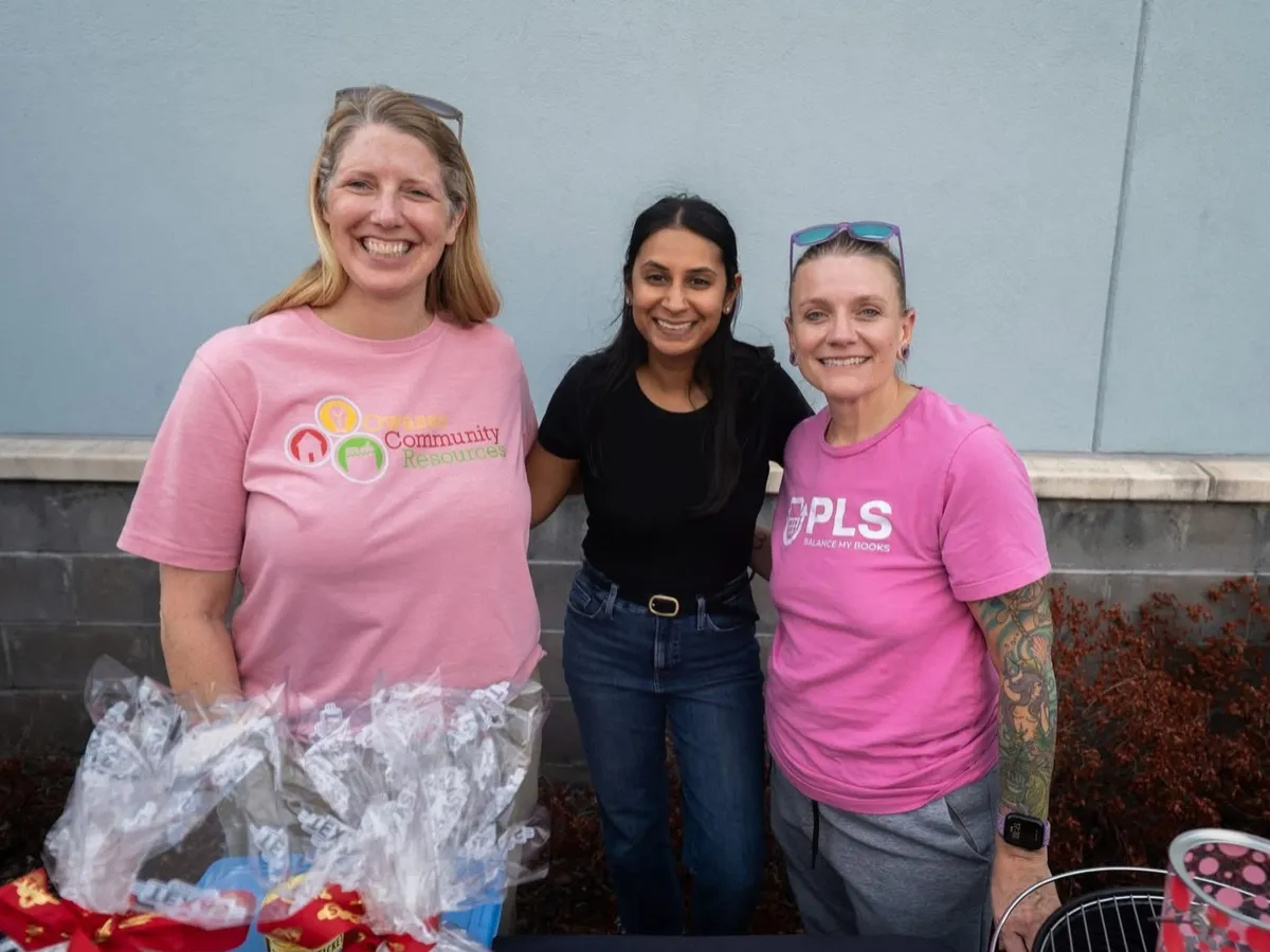 Layne volunteered with the OCR staff at a fundraising event at Liquids Wine & Spirits.
