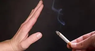 Refusing a cigarette with a raised hand