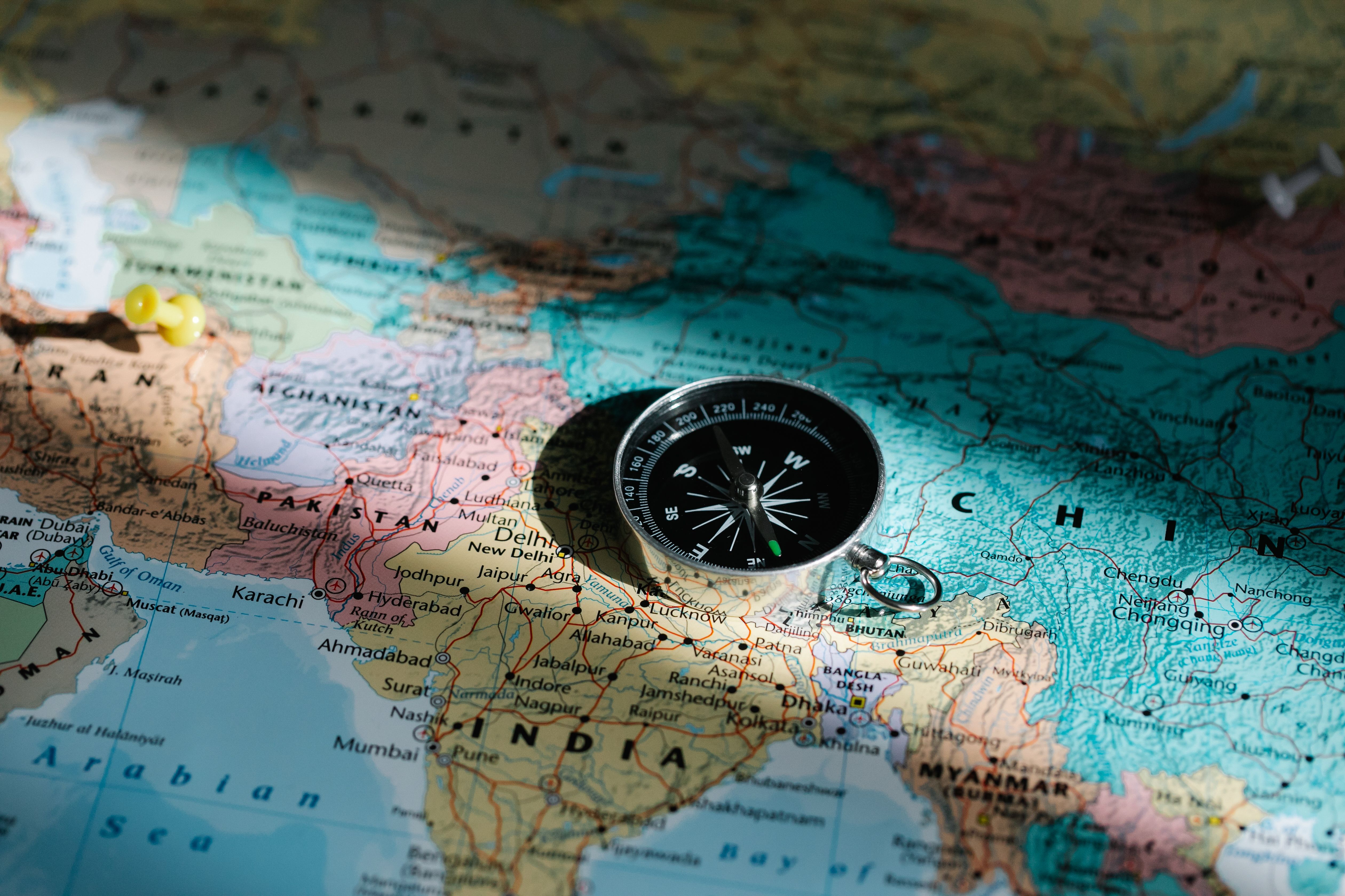 A compass and a map showing how one without the other is not that powerul