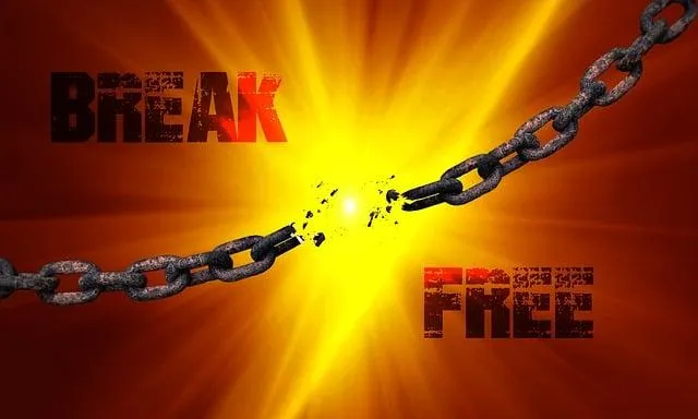 Broken chain symbolizing freedom from limiting beliefs