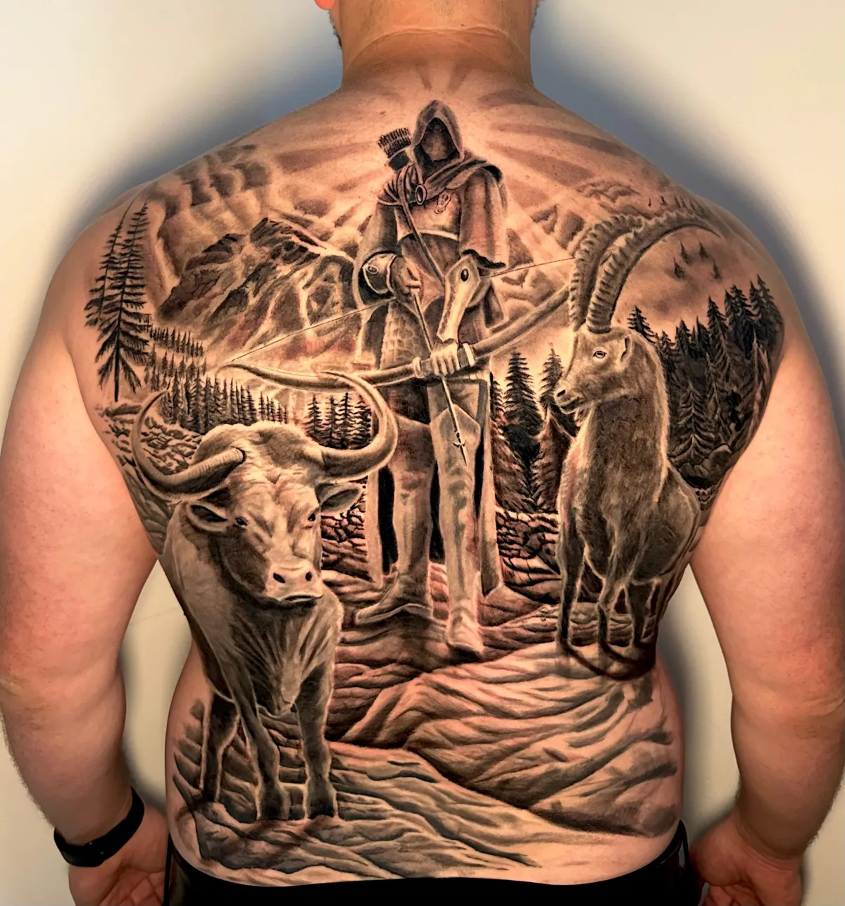 person with tattoo on right arm