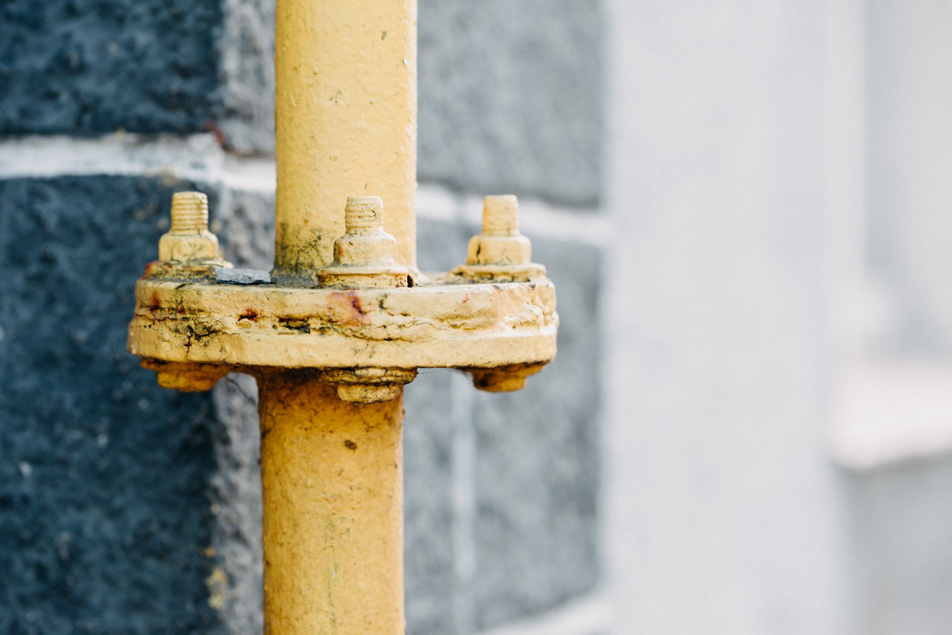 Gas line fittings being sealed during a repair
