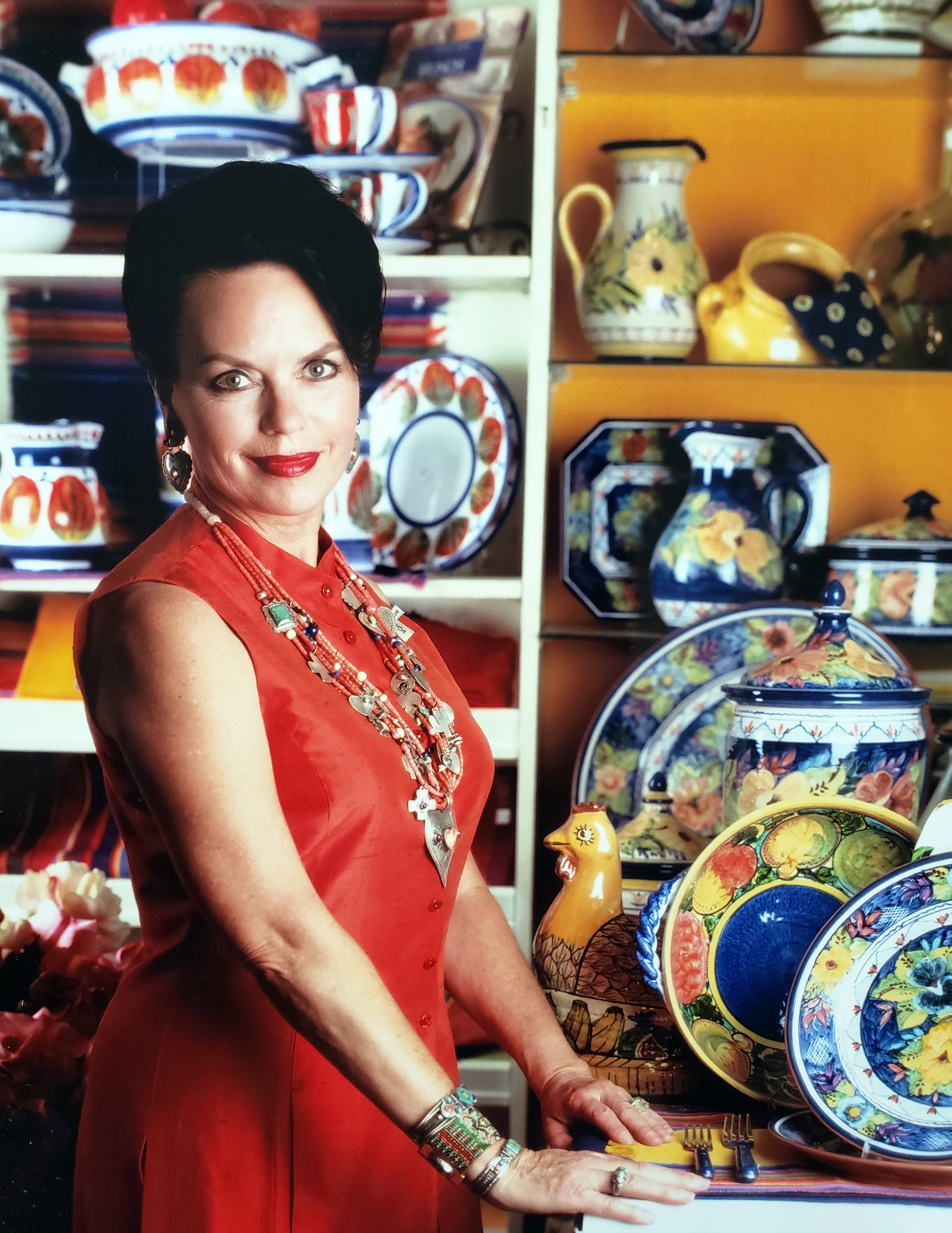 Diane Powers in her courtyard with authentic pottery