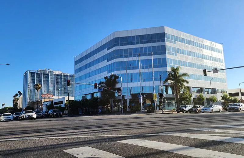  A wide-angle street view of a busy intersection in San Fernando, California