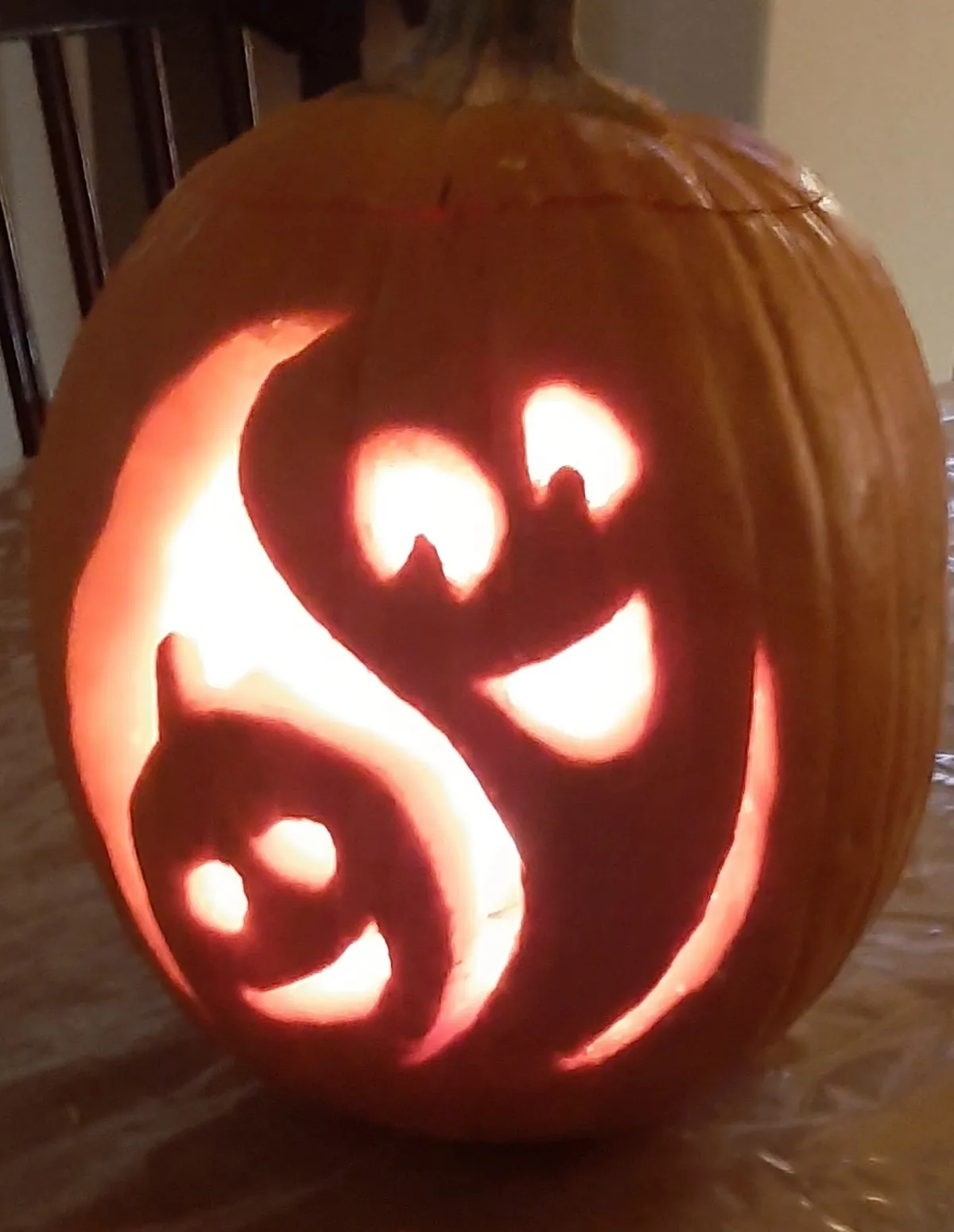 Suburban street decorated for Halloween with families in costumes