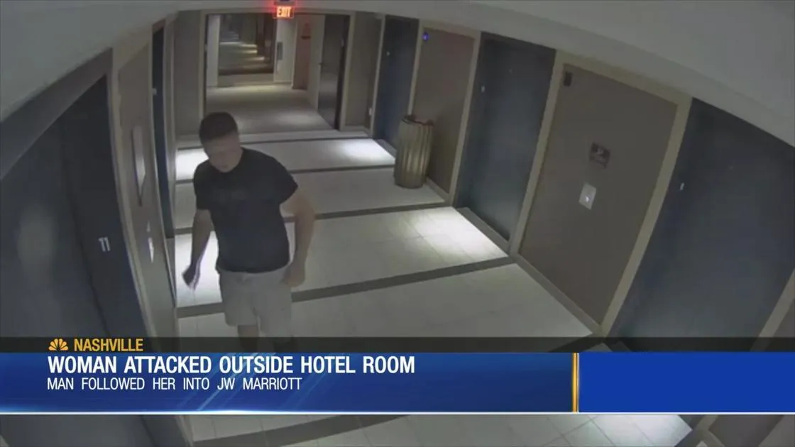 Image of criminal in hotel used to illustrate dangers like attacks outside hotel rooms.