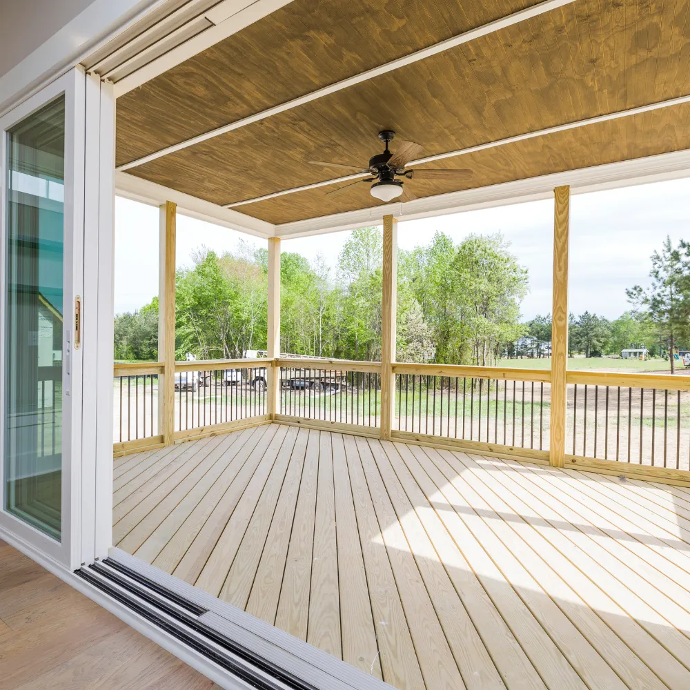 Newly built two-story suburban home with attached garage and fresh sod landscaping.
