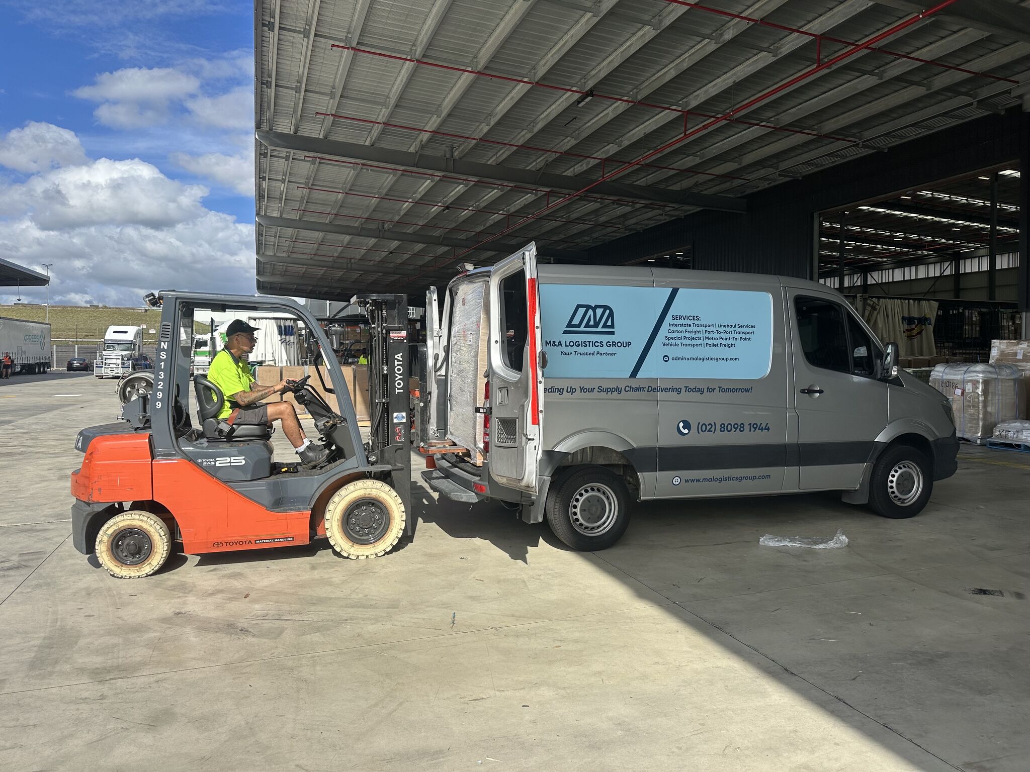 M&A Logistics Group car carrier, Ingleburn Sydney (vary slightly for each, forklift unloading