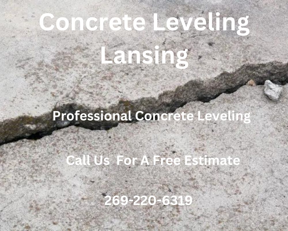 Cracked concrete driveway in Lansing, MI showing sinking slab before concrete leveling services.