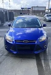 woman placing sticky notes on wall