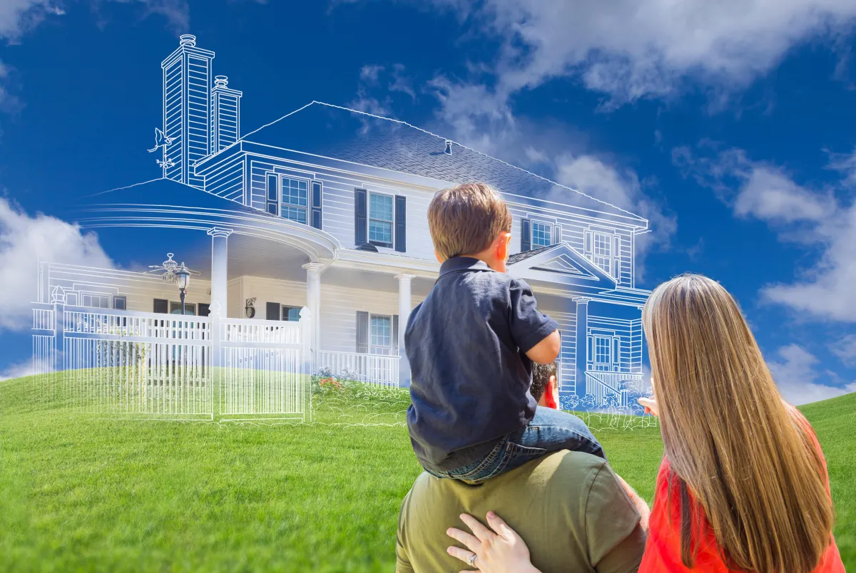 Homeowners looking at their house