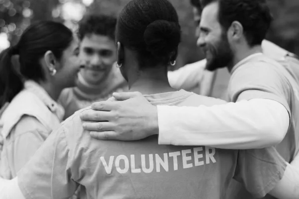 The importance of social responsibility and community involvement in addressing poverty and inequality