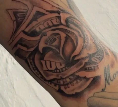 person in blue denim shorts and white nike sneakers standing on gray concrete floor