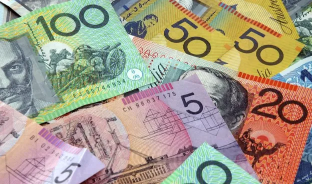 A bunch of money sitting on top of a table