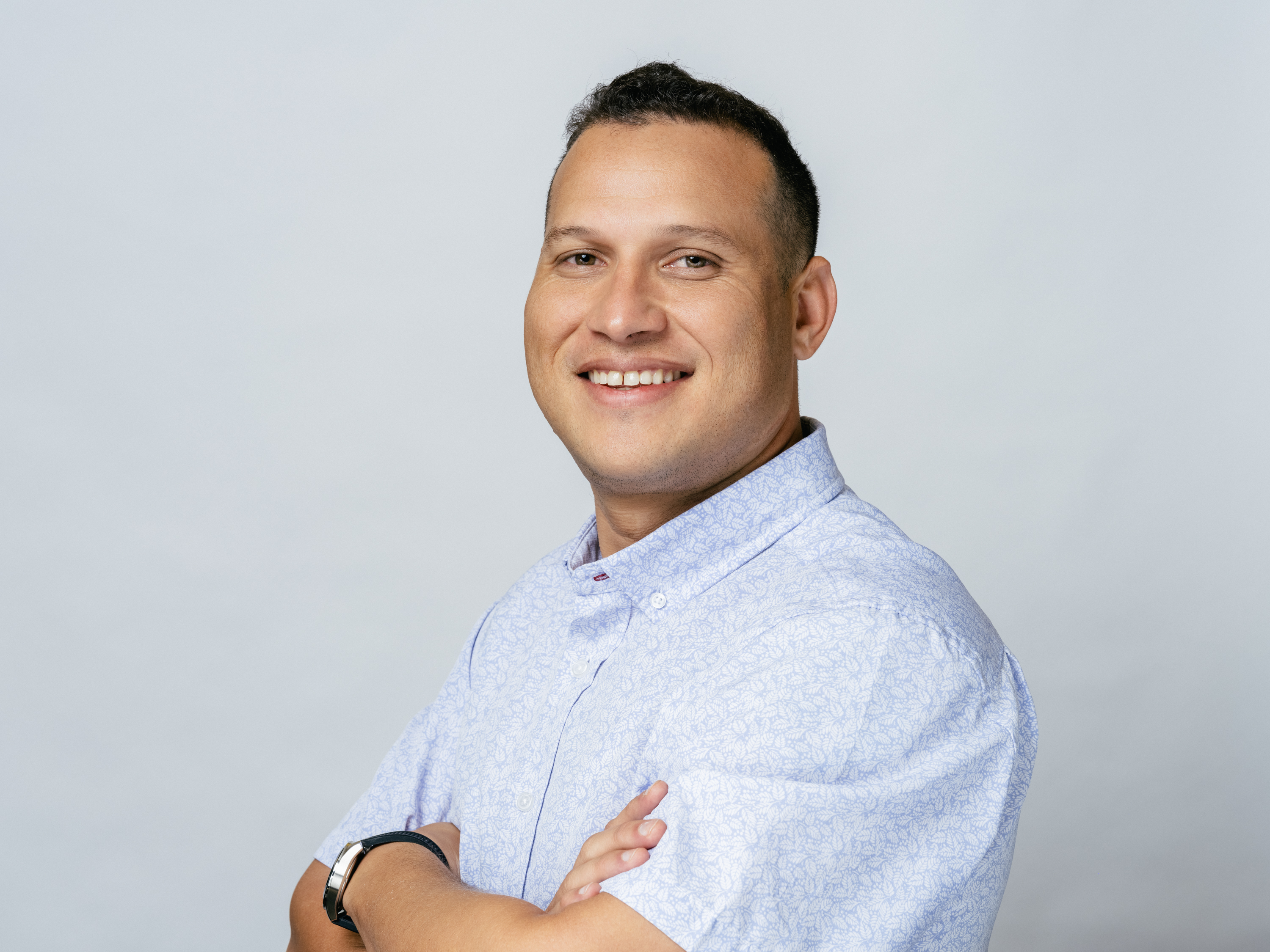 man holding incandescent bulb
