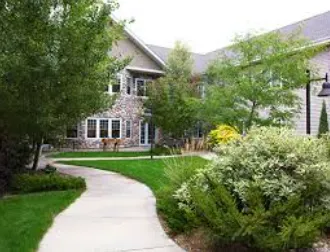 Composite deck with pergola in Sunset Drive Mandan backyard