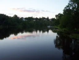 Composite deck with seating area in Southwest Minot backyard