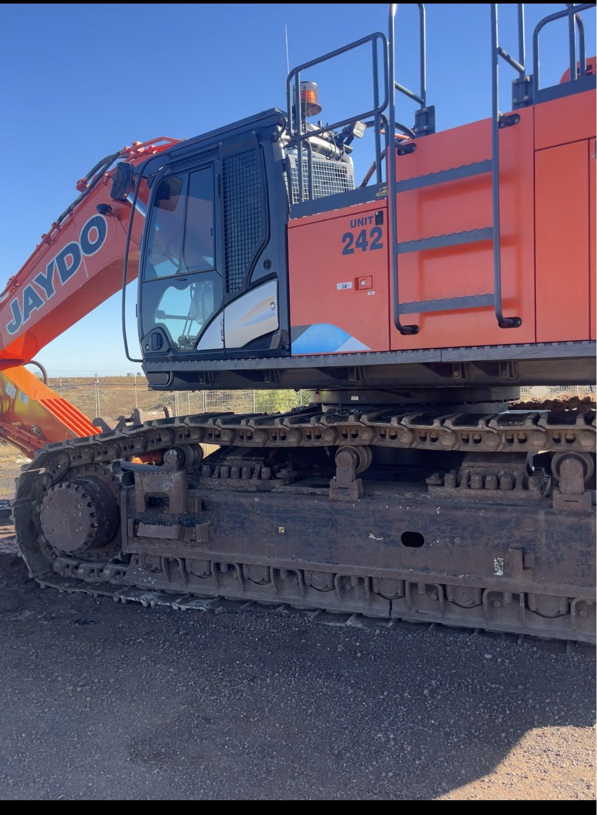 a blue truck parked in front of a building